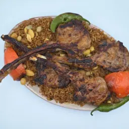 ريش ضاني مشوية مع أرز بالخلطة